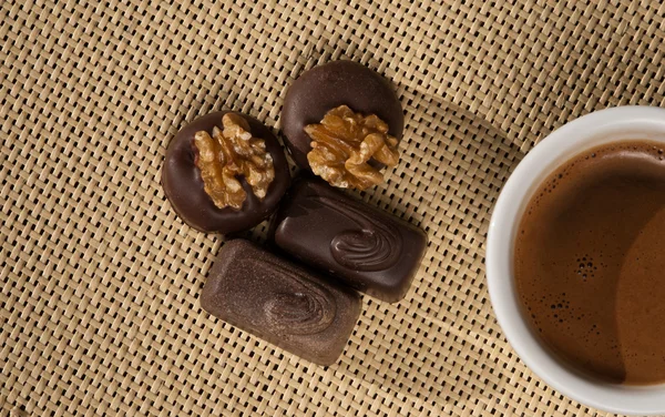 Cup of coffee and Chocolates — Stock Photo, Image