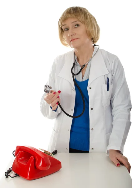 Mature doctor and phone — Stock Photo, Image
