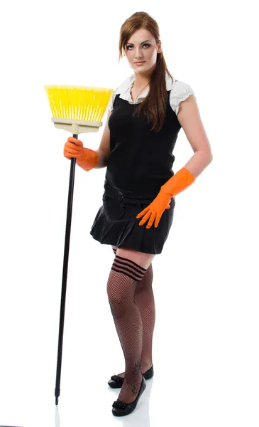 Girl standing with broom — Stock Photo, Image