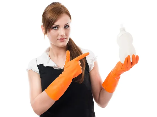 Mujer joven en guantes de goma naranja —  Fotos de Stock