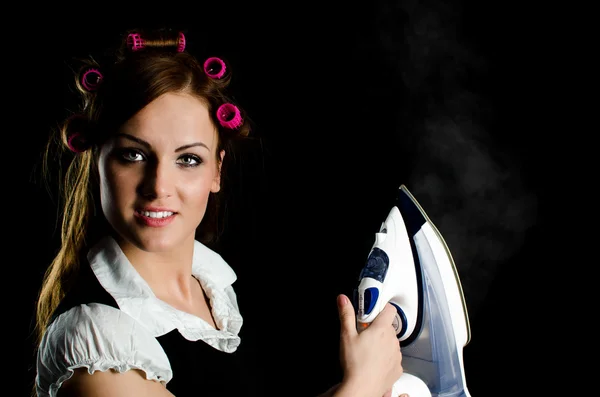 Beautiful woman with curlers — Stock Photo, Image