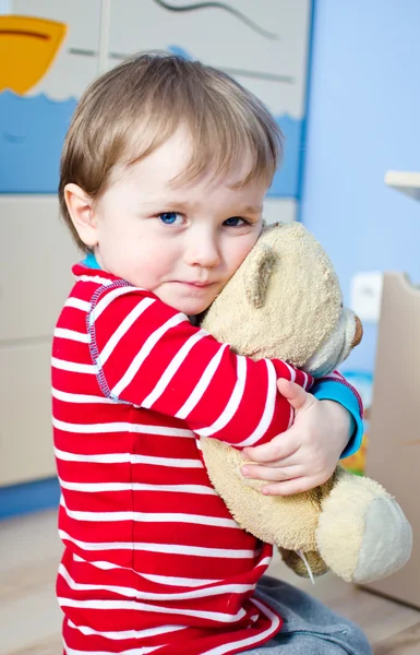 Boy with teddy bear — Stock Photo, Image