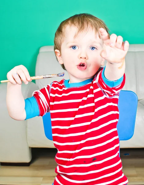 Baby boy with paintbrush — Stock Photo, Image