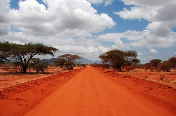Uma estrada vermelha — Fotografia de Stock