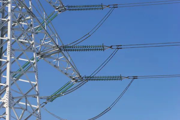 Electricity pylon before blue sky — Stock Photo, Image