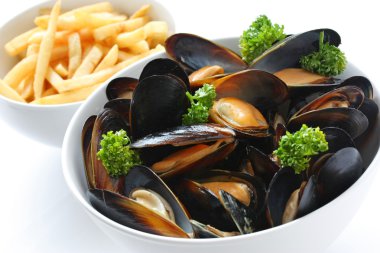Steamed mussels with white wine, and french fries clipart