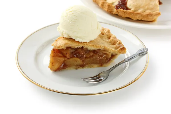 Homemade apple pie topped with ice cream — Stock Photo, Image