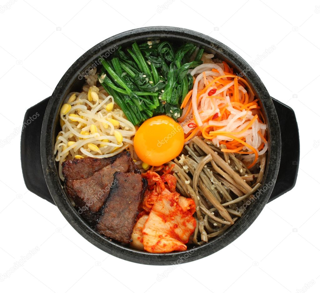 Bibimbap in a heated stone bowl, korean dish