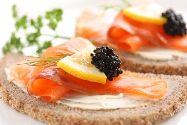 Smoked salmon canapes clipart