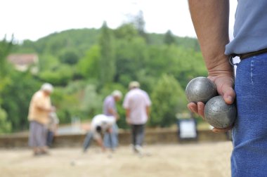 Playing jeu de boules clipart