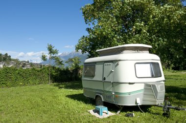 Caravan at camping clipart