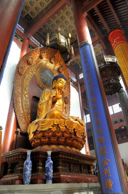 Famous giant seated Buddha at Lingyin Temple clipart