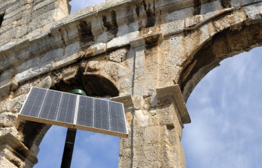 Amphitheater in Pula, Croatia with in front solar cell clipart