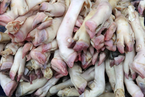 Pig legs or pata in a street market — Stock Photo, Image