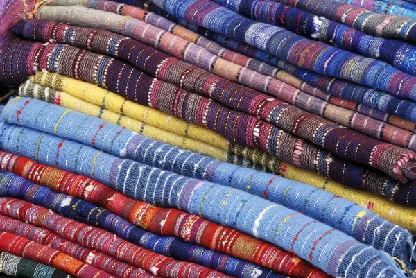 Fabrics at a market — Stock Photo, Image