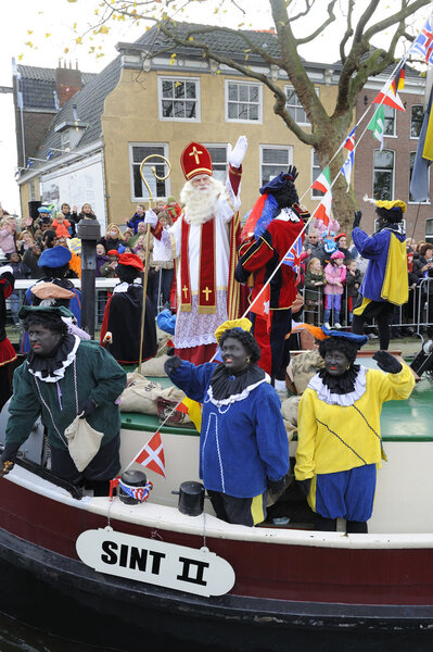 Santa Claus arrives on aboat from Spain in Holland.