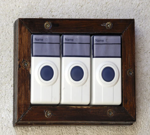Три дзвінки дверні — стокове фото