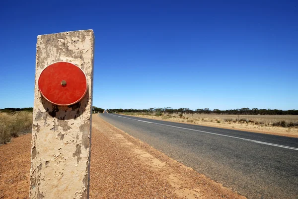 Red reflector at the Eyre Highway Stock Picture
