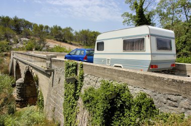 Caravan at a bridge clipart