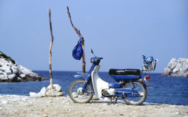 Motorbike at sea shore clipart