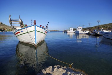 Fisher boats in the harbor clipart