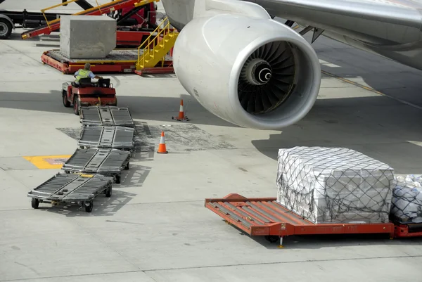 Loading an airplane with airfreight Royalty Free Stock Images