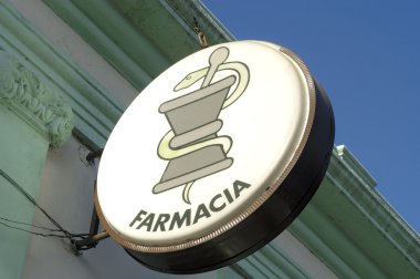 Farmacia sign in Spain clipart