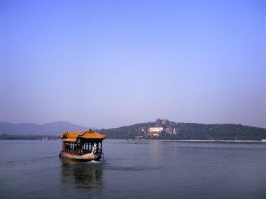 Chinese Dragon Boat at the Kuming lake clipart