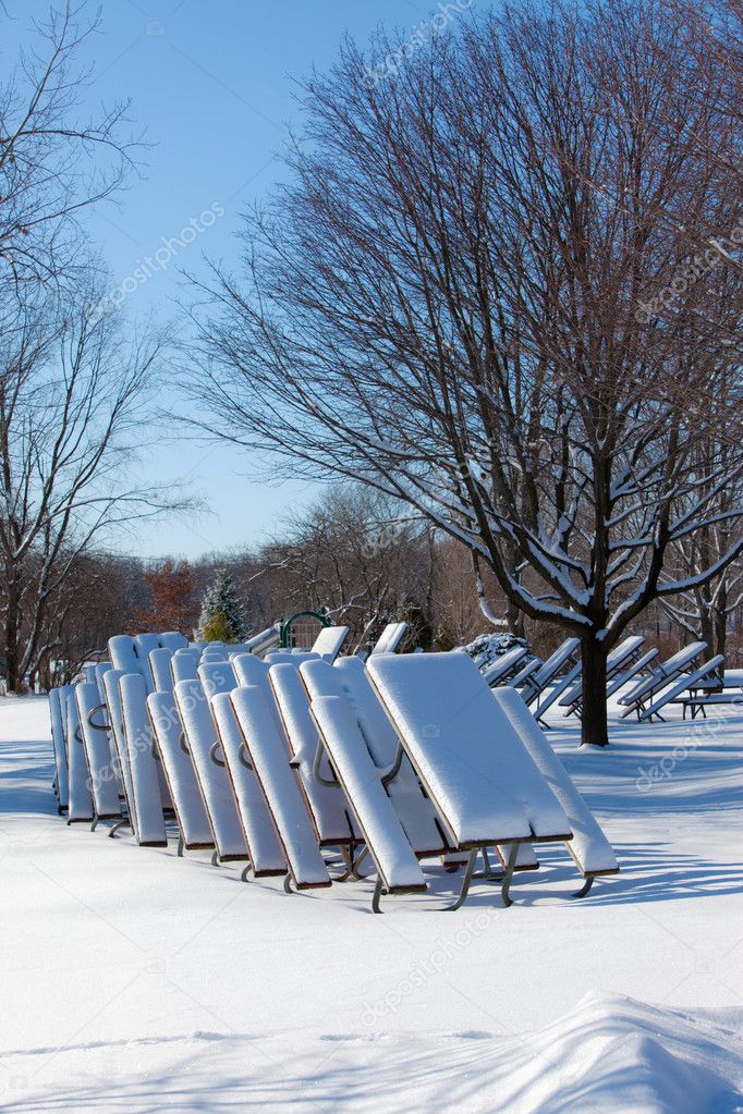 Snow Covered Picnic tables