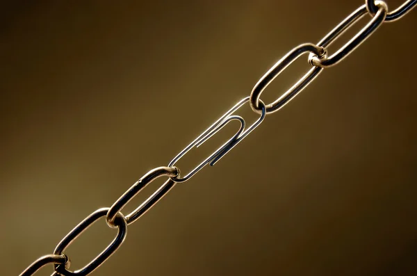 stock image Weak chain with a paper clip