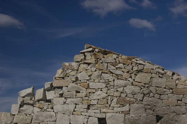 stock image Rock stone wall opposite to blue sky