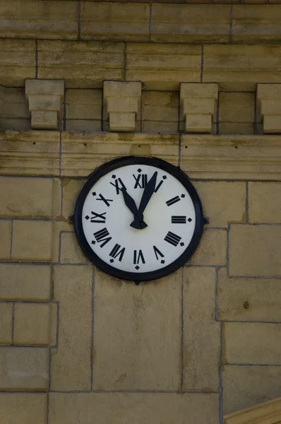 stock image Clock in an old and classic facade