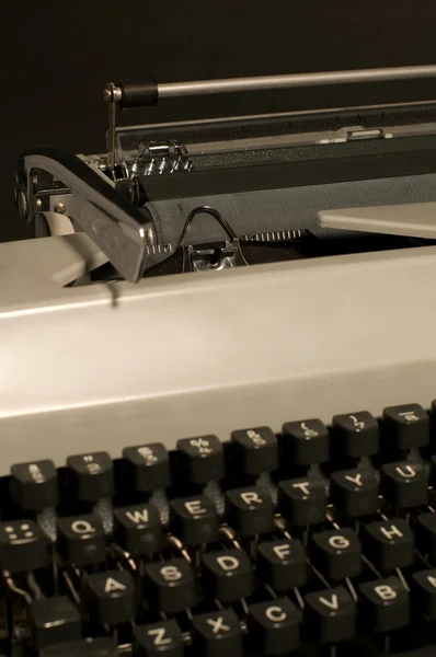 Vintage typewriter on black background — Stock Photo, Image