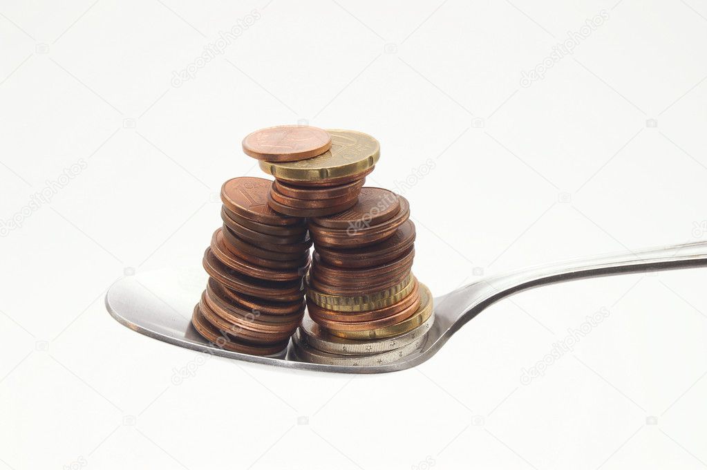 Spoon with coins