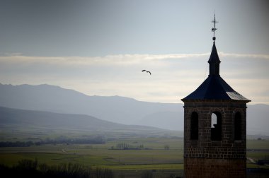 Silhouette of a bell tower in Avila, spain clipart