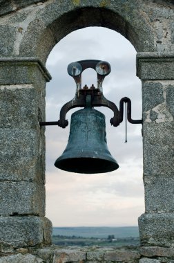 Bell on Bellfry over Cloudy Sky clipart