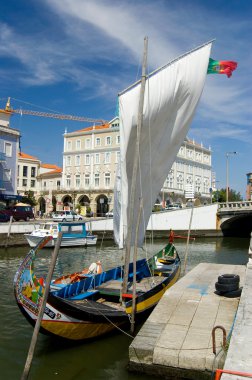 Typical Moliceiro in Vouga river. Aveiro, Portugal clipart