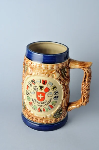 Mug decorated with Swiss flags. — Stock Photo, Image