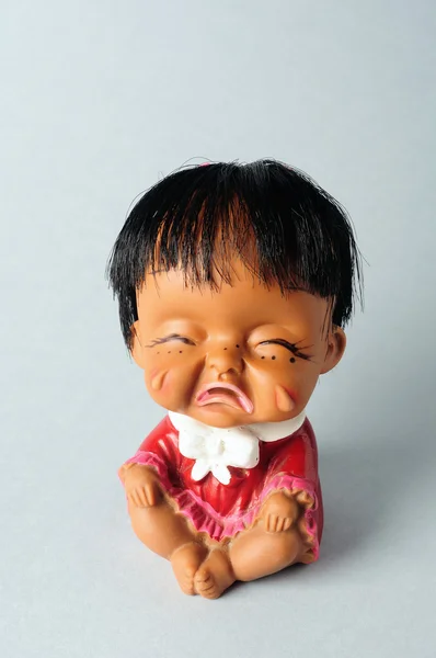 Oriental girl doll crying — Stock Photo, Image