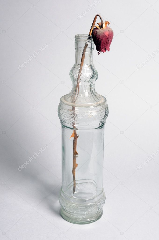 Wilted flower bottle.