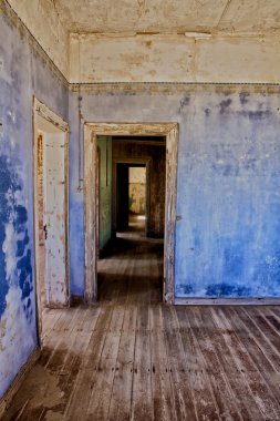 Old house in kolmanskop's ghost town in namibia clipart