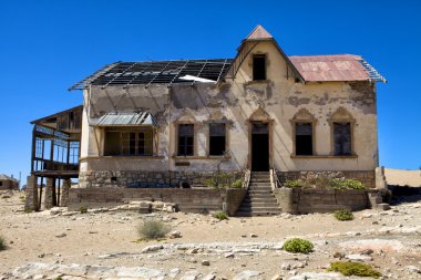 Ruine of an old house in kolmanskop namibia africa clipart