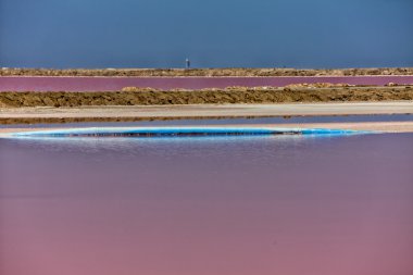 Saltworks in walvis bay near swakopmund namibia africa clipart