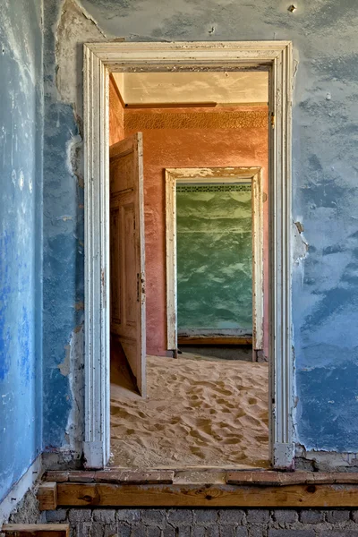 Dune in a house at kolmanskop ghost town — Stock Photo, Image