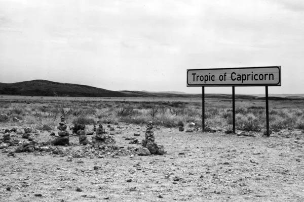 Tropic of capricorn sign in namibia africa beside a road — Stock Photo, Image
