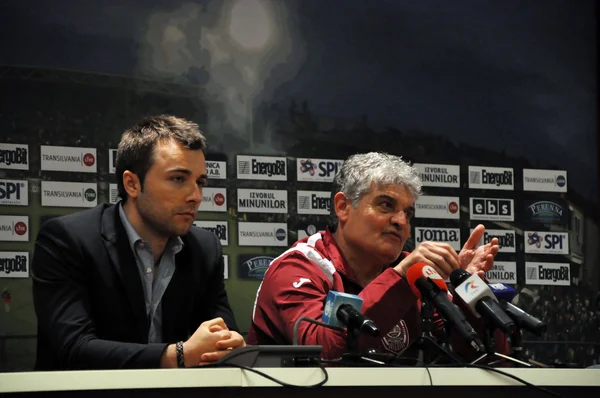 Soccer coach at press conference — Stock Photo, Image