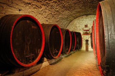 Barrels in a wine-cellar clipart
