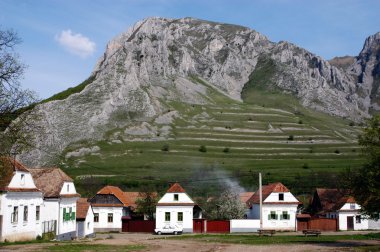 Hungarian village in a mountainous region clipart