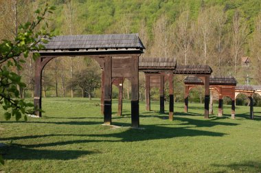 Szekler gates in Szejkefurdo. Transylvania, Romania clipart