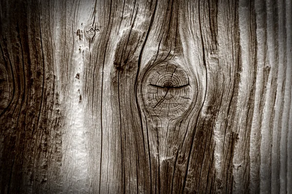 Nahaufnahme der körnigen Holzstruktur mit Knoten — Stockfoto